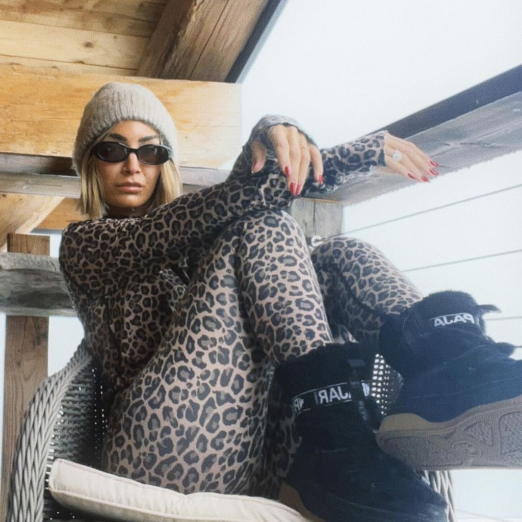 Frankie Bridge in leopard print ski wear