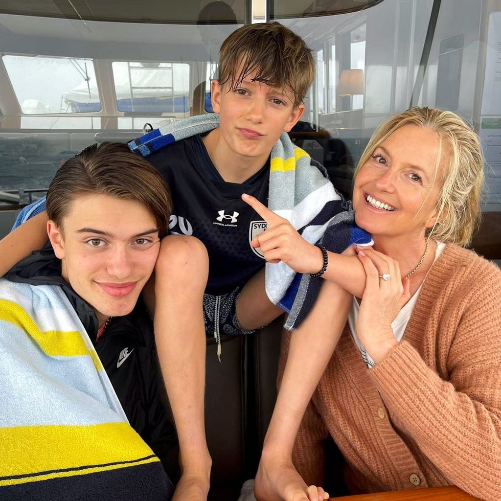 Penny Lancaster posing with her two sons, Alastair and Aiden