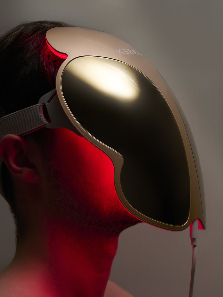 man wearing Keskine LED light mask