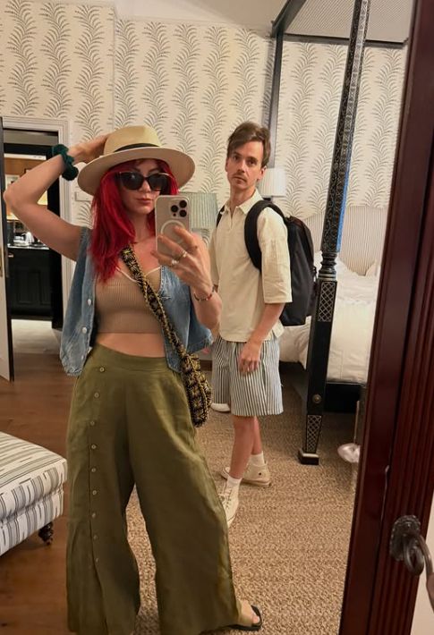 Dianne Buswell and Joe Sugg inside a hotel bedroom