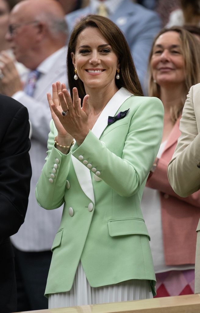 Kate Middleton in green blazer clapping