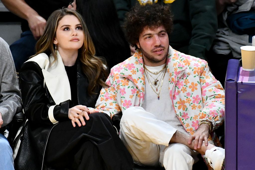 Selena Gomez and Benny Blanco attend a basketball game between the Los Angeles Lakers and the Miami Heat 