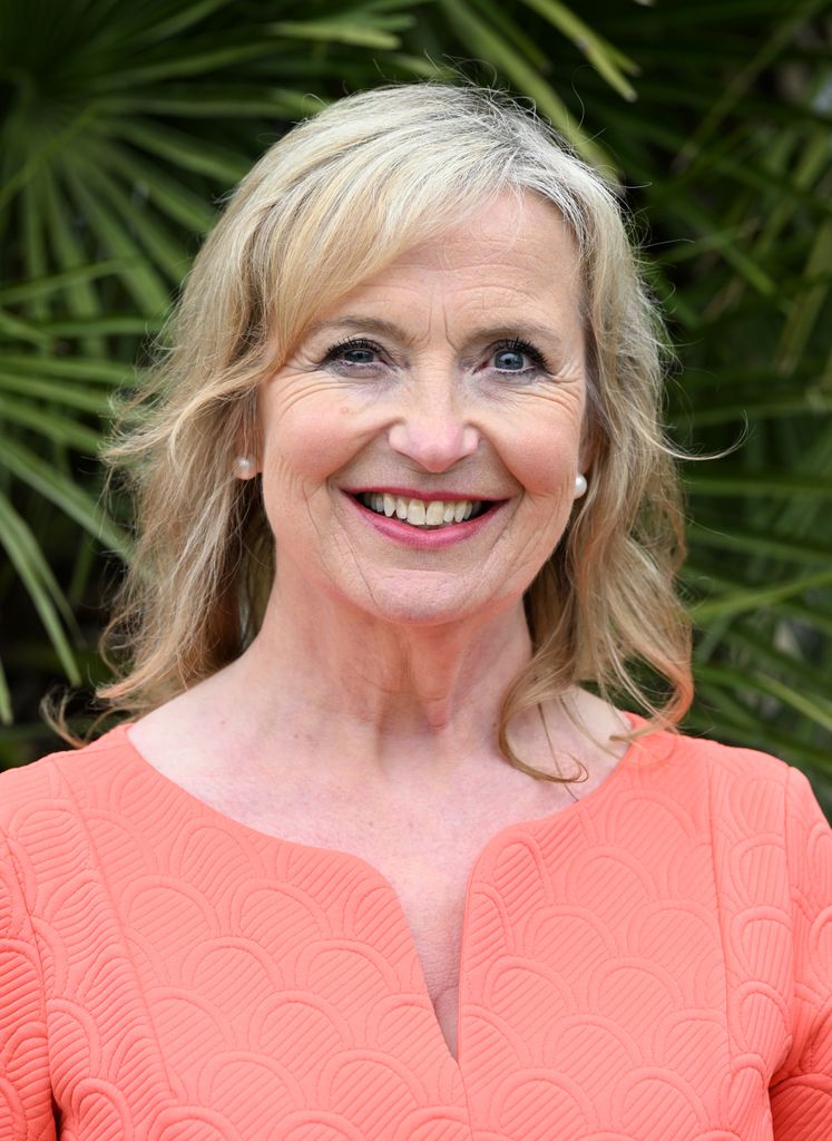 Carol Kirkwood in a peach-coloured outfit