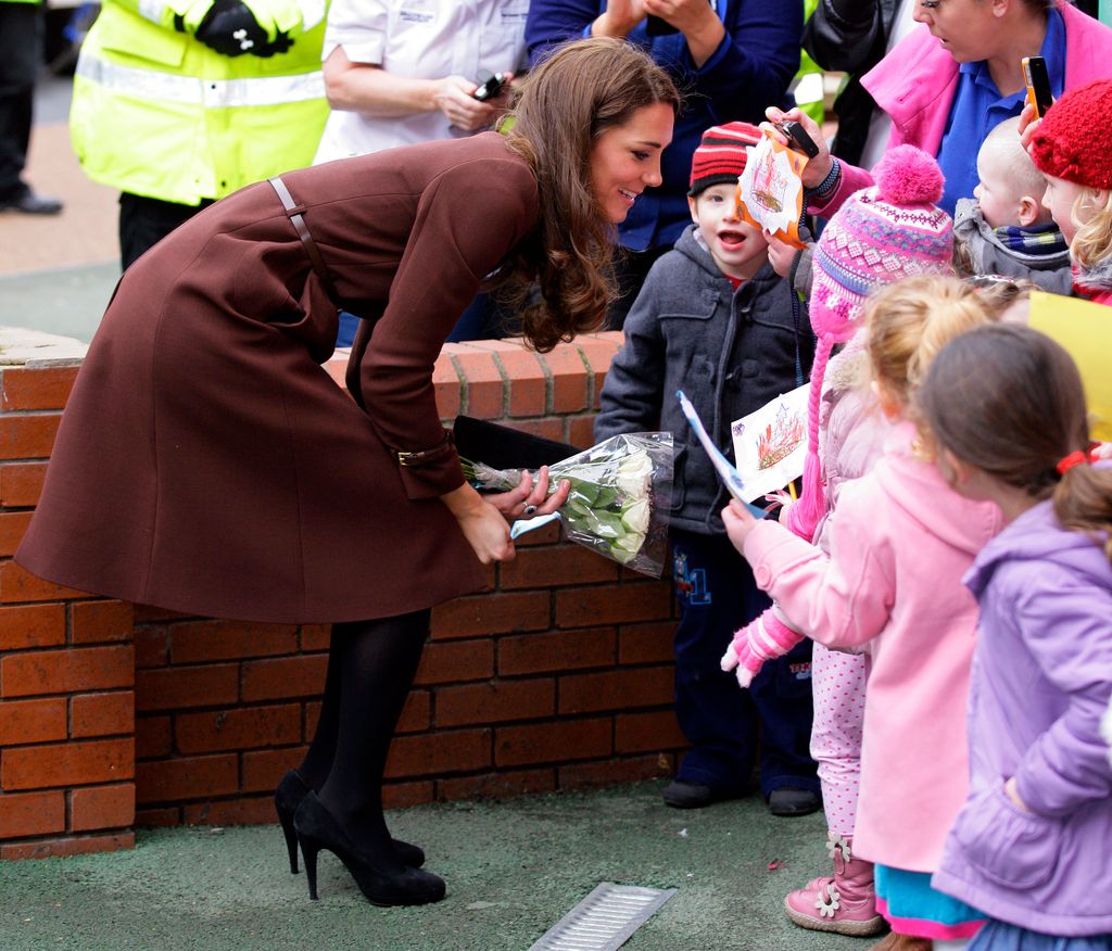 Kate talking to children 