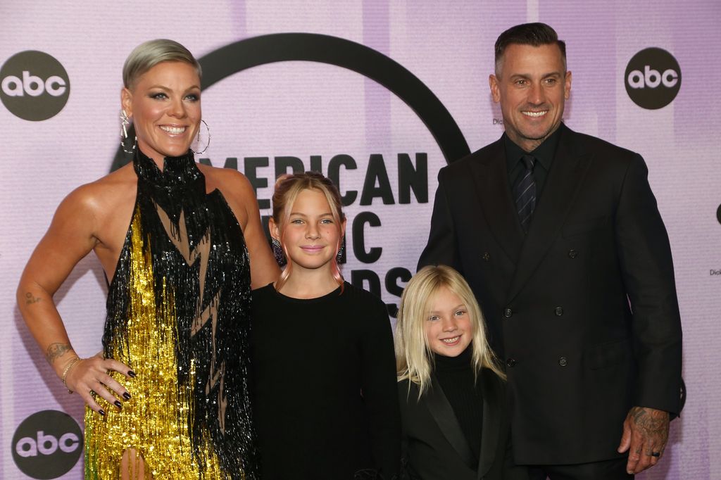 Pink and Carey Heart with their two children