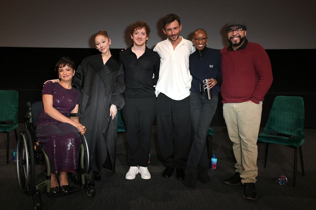 Marissa Bode, Ariana Grande, Ethan Slater, Jonathan Bailey, Cynthia Erivo pose onstage as Universal Pictures presents a special "Wicked For Good" Q&A