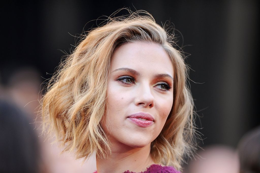 Scarlett Johansson in cerise dress on red carpet