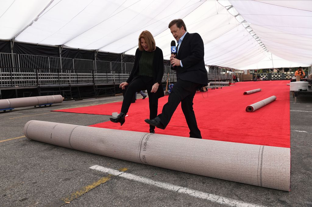 Kathy Connell, SAG Awards Executive Producer, (L) and Sam Rubin, KTLA Entertainment Reporter, roll out the ceremonial red carpet in 2018