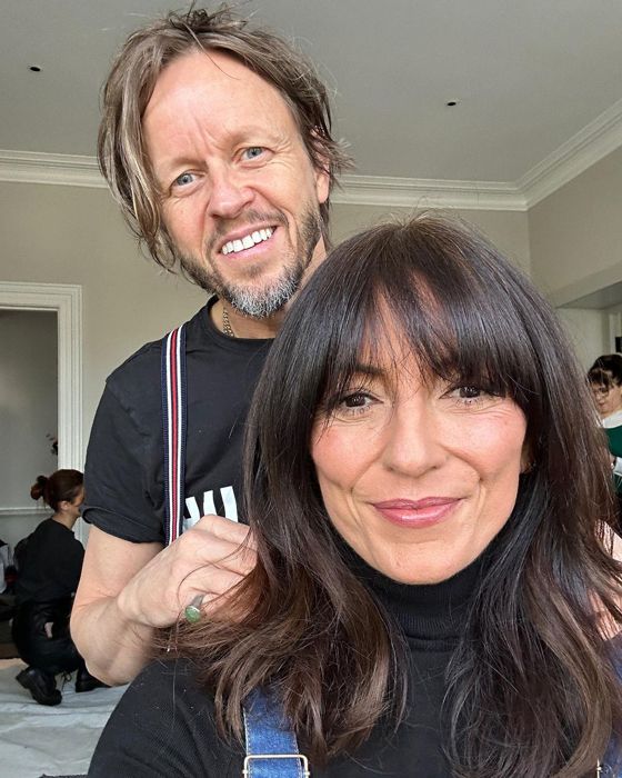 Davina McCall and her husband smiling for a selfie