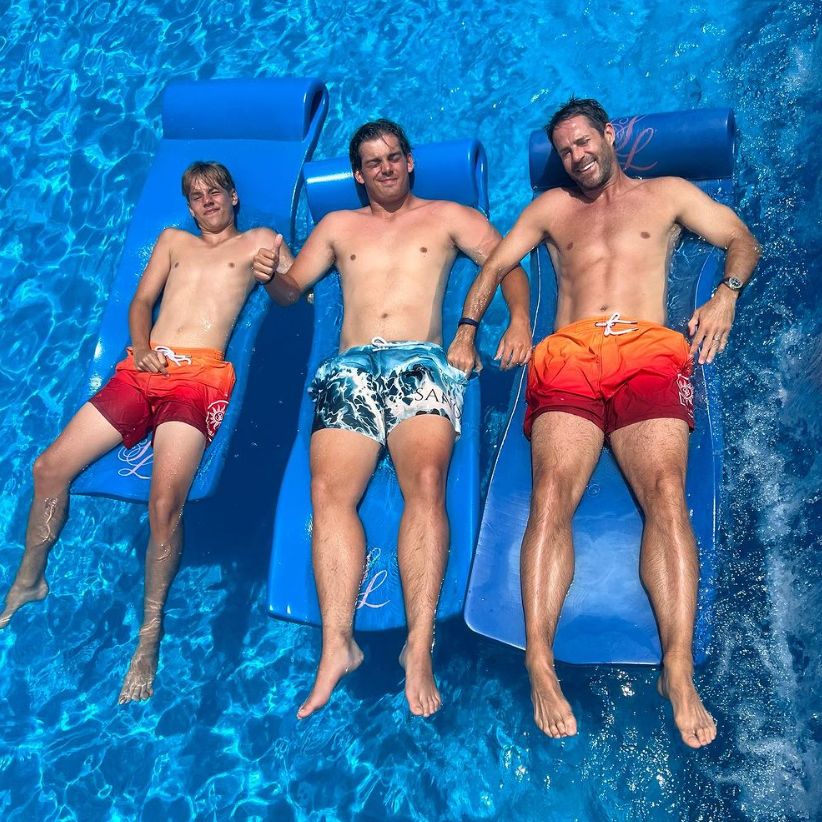 Jamie Redknapp and his teenaged suns relaxing on pool floats