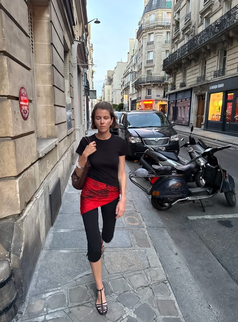 Monica wearing red scarf belt