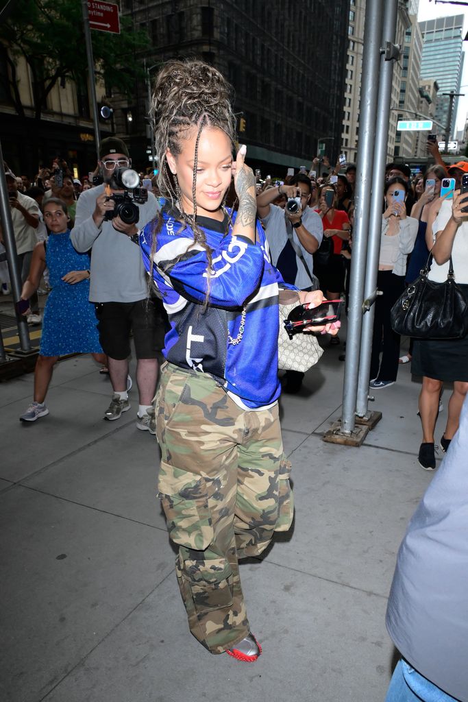 Riri wore her Y2K inspired outfit in NYC, adding a Gucci tote and PUMA trainers