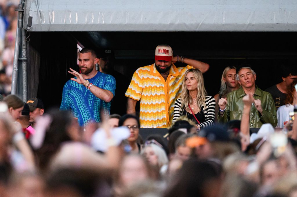 Travis Kelce was pictured alongside Baz Luhrmann at Friday's concert