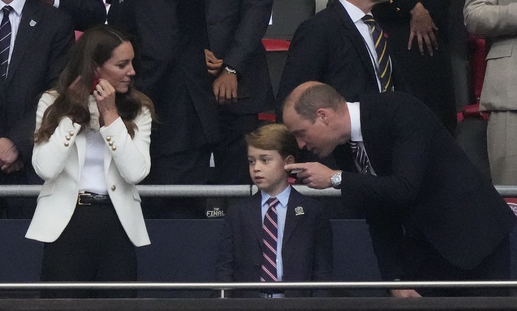 Kate Middleton, Prince George and Prince William at a football match