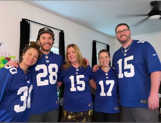 Kaley Cuoco with Tom Pelphrey and his family
