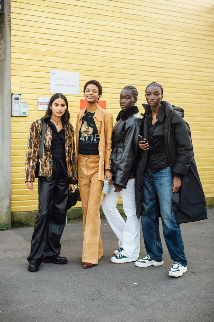 Models post-show at Milan Fashion Week 