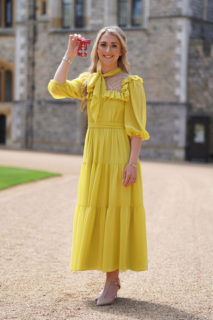 Dame Laura Kenny poses after she received her Dame Commander medal