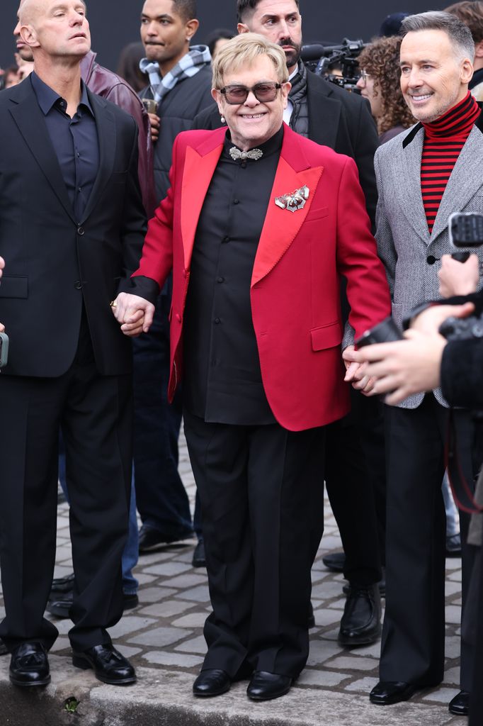 Elton John and David Furnish attend Valentino