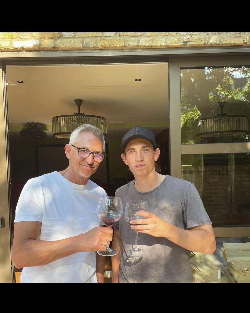 Gary Lineker having a glass of wine with his son