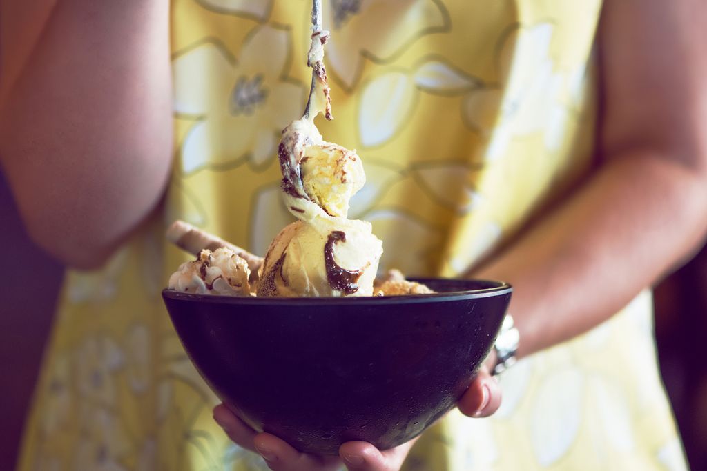 woman holding bowl of banana ice cream