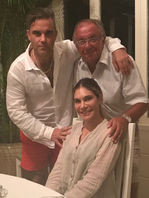 Robbie Williams with his dad ad Pete Conway and wife Ayda Field
