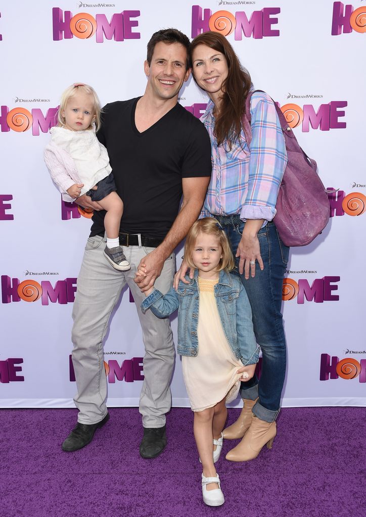 christian oliver with his wife and daughters 2015