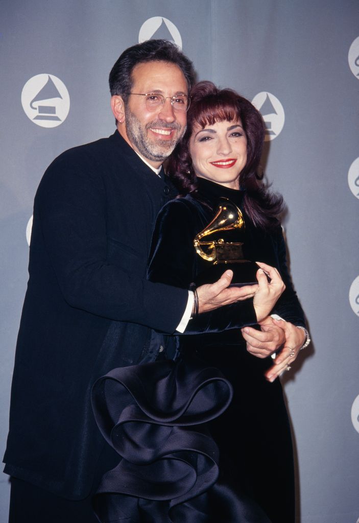 Cuban-American musician and producer Emilio Estefan and his wife, Cuban-American singer-songwriter Gloria Estefan attend the 36th Annual Grammy Awards, held at Radio City Music Hall in New York City, New York, 1st March 1994
