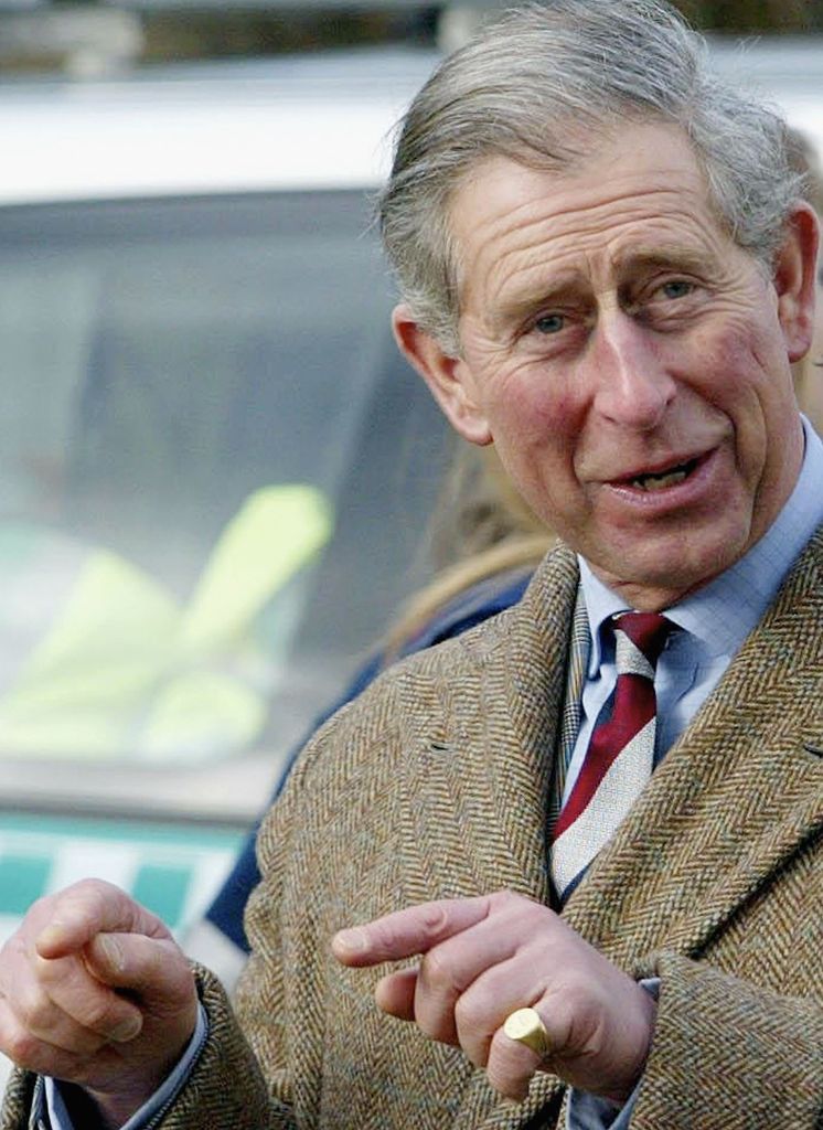 Charles wearing a signet ring
