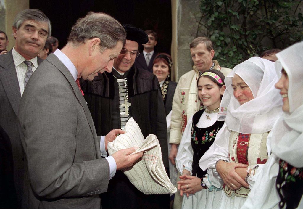 King Charles recieving a woven gift