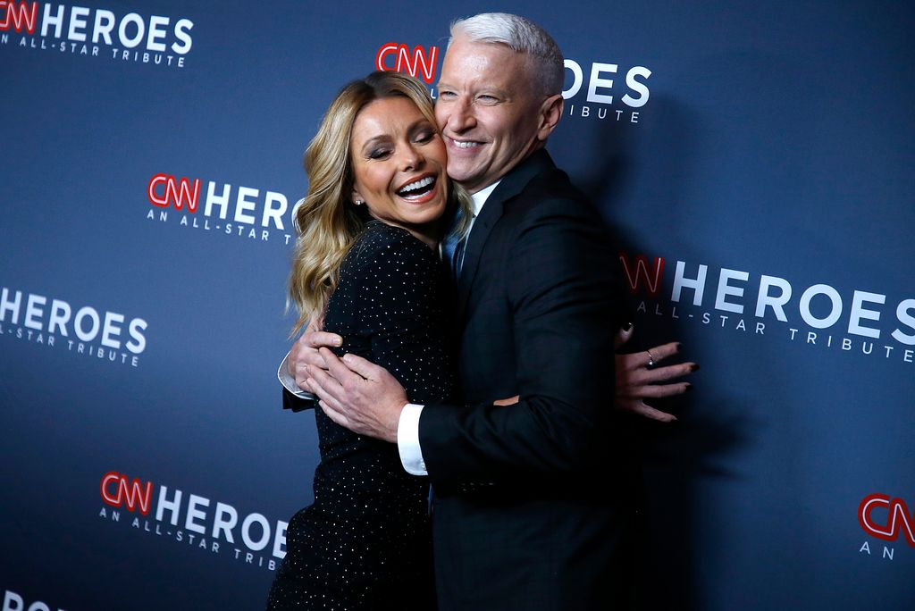 Kelly Ripa and Anderson Cooper attend 12th Annual CNN Heroes: An All-Star Tribute at American Museum of Natural History on December 09, 2018 in New York City