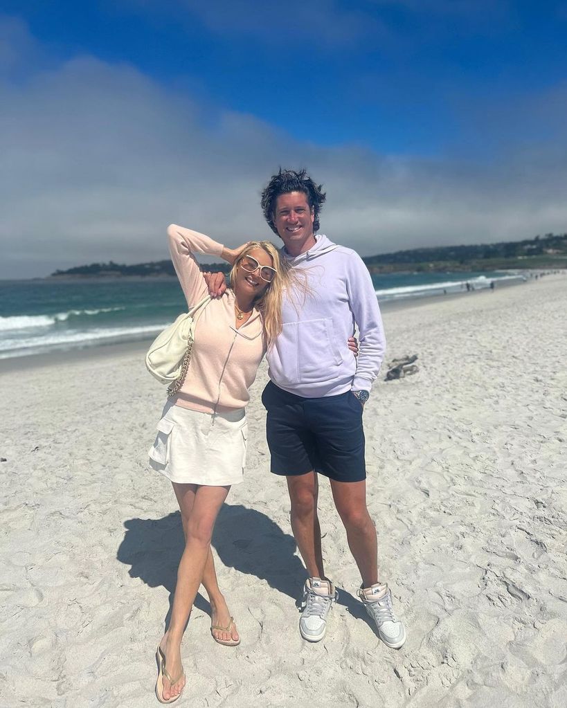 Tess Daly and Vernon Kay posing on beach in California 