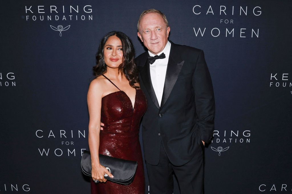 TOPSHOT - US-Mexican actress Salma Hayek (L) and her husband French businessmans Francois-Henri Pinault arrive for the Kering Foundation's second annual Caring for Women Dinner at The Pool in New York City on September 12, 2023. Salma Hayek Pinault, Francois-Henri Pinault, Zoe Kravitz, Cindy Sherman, Christy Turlington Burns, Olivia Wilde, Oprah Winfrey and Malala Yousafza will co-chair The Kering Foundation's second annual Caring for Women Dinner. (Photo by KENA BETANCUR / AFP) (Photo by KENA BETANCUR/AFP via Getty Images)