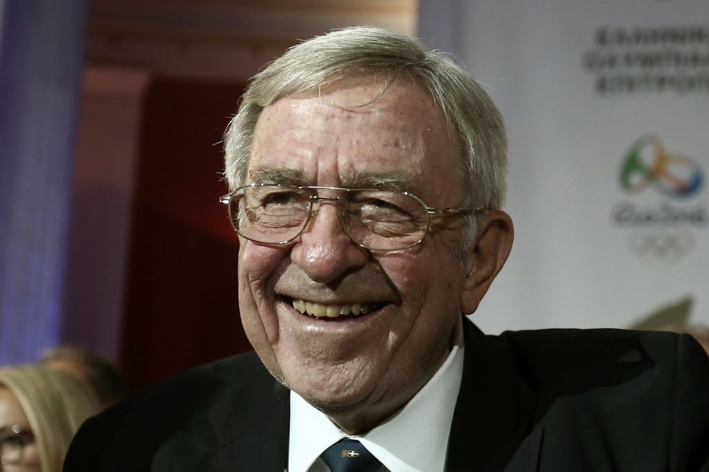 King Constantine in a black suit