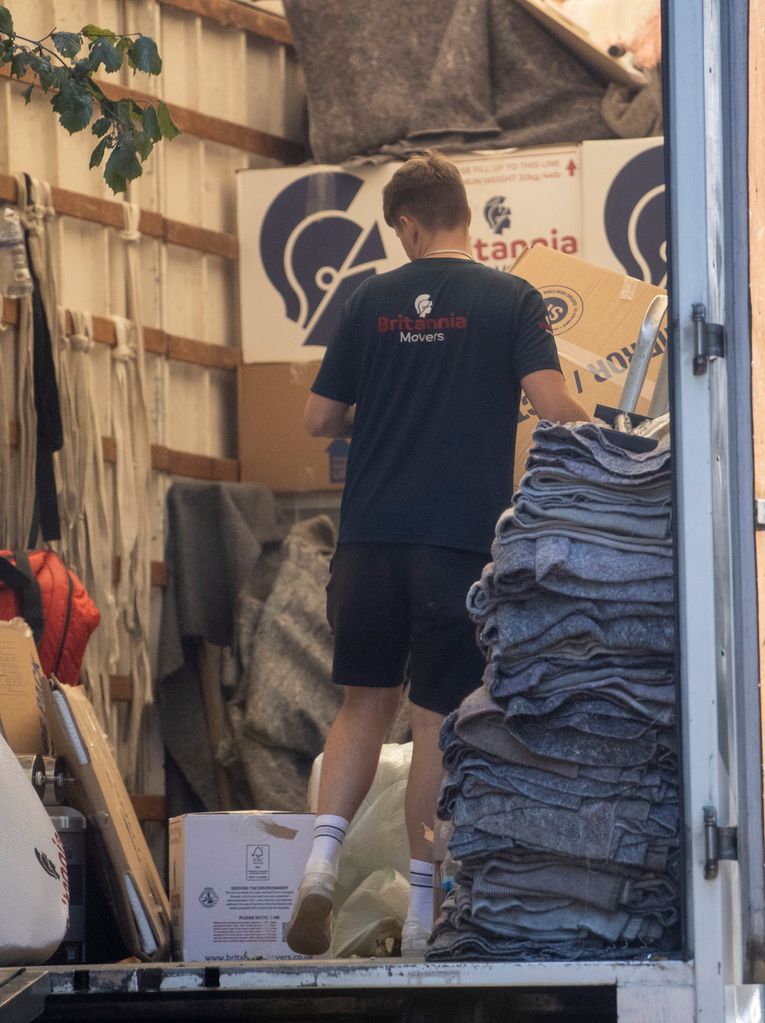 Removal vans were pictured outside Holly's London home 