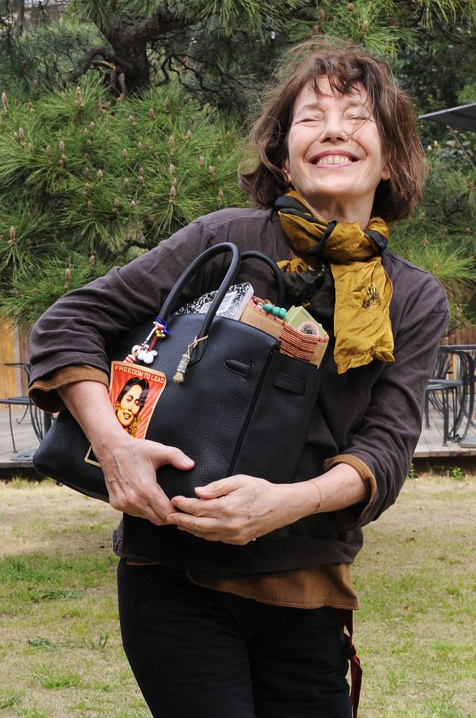 Jane Birkin with her eponymous Birkin bag