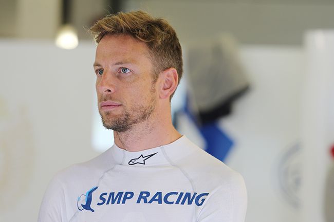 Jenson Button in white uniform