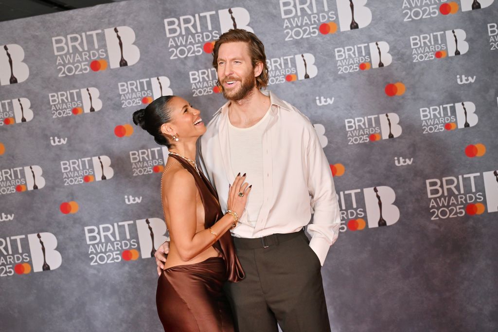Vick Hope and Calvin Harris arrive at The BRIT Awards 2025 at The InterContinental London O2 on March 1, 2025 in London, England