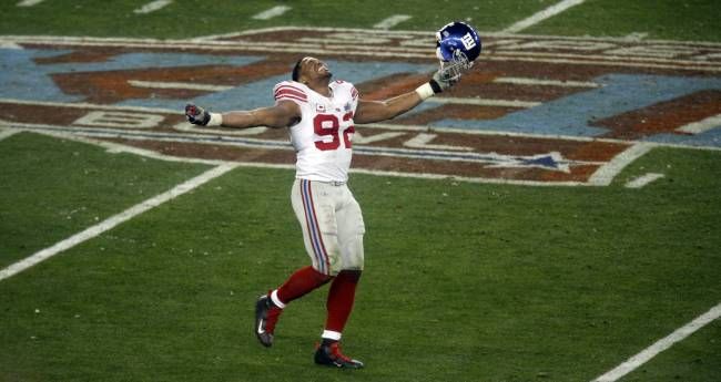 Michael Strahan celebrates the Giants Super Bowl win in 2008