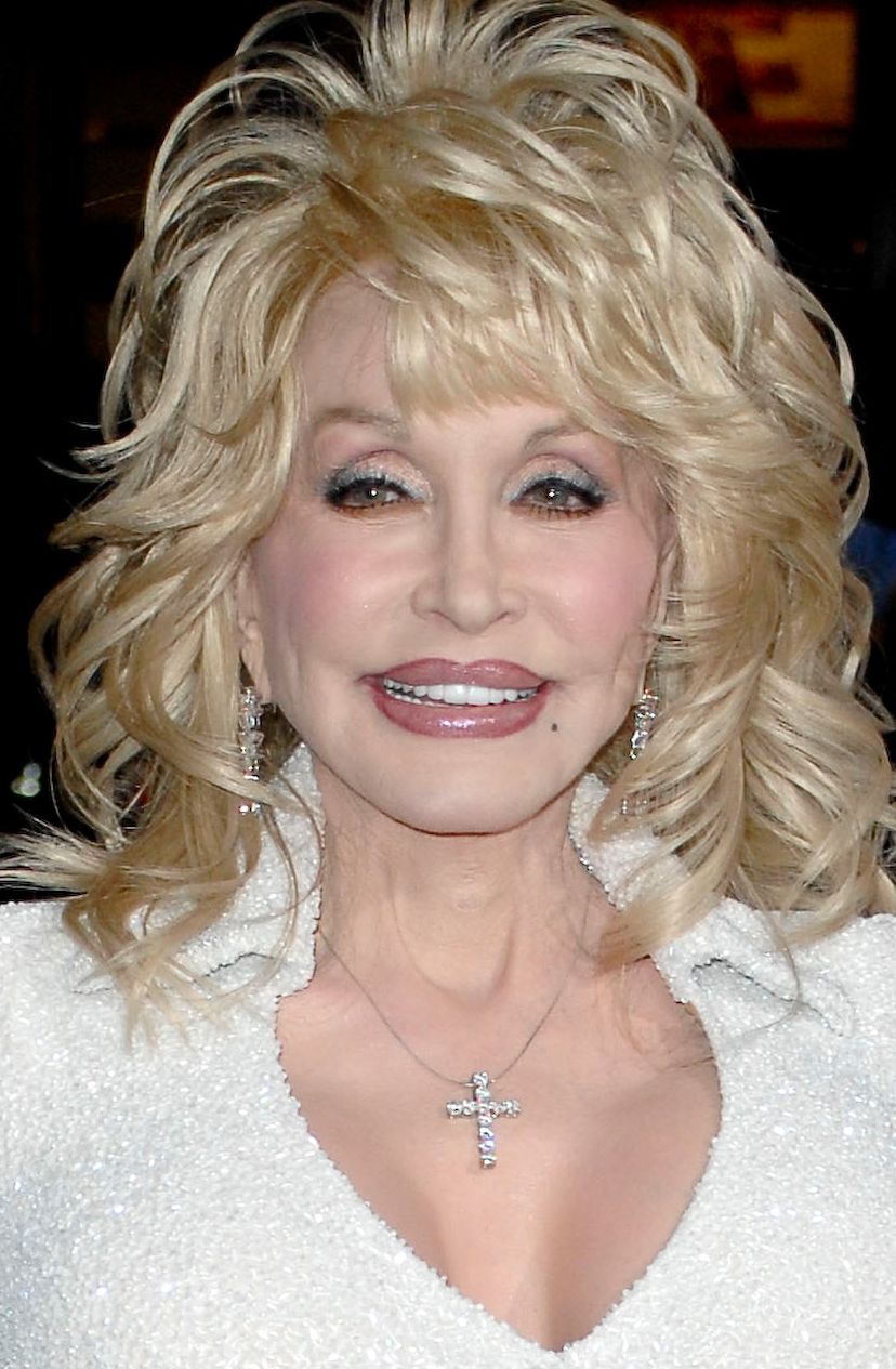 Dolly Parton in a white dress
