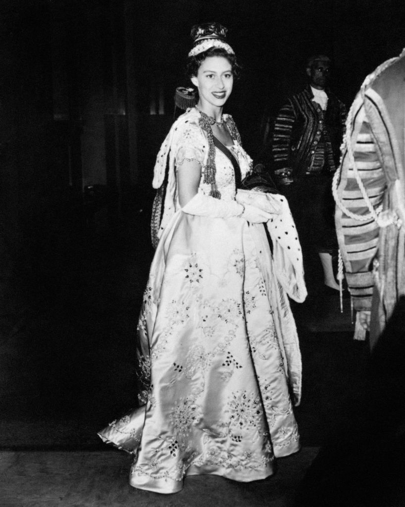 Princess Margaret wearing a coronet and gown at the coronation of her sister Queen Elizabeth II.   