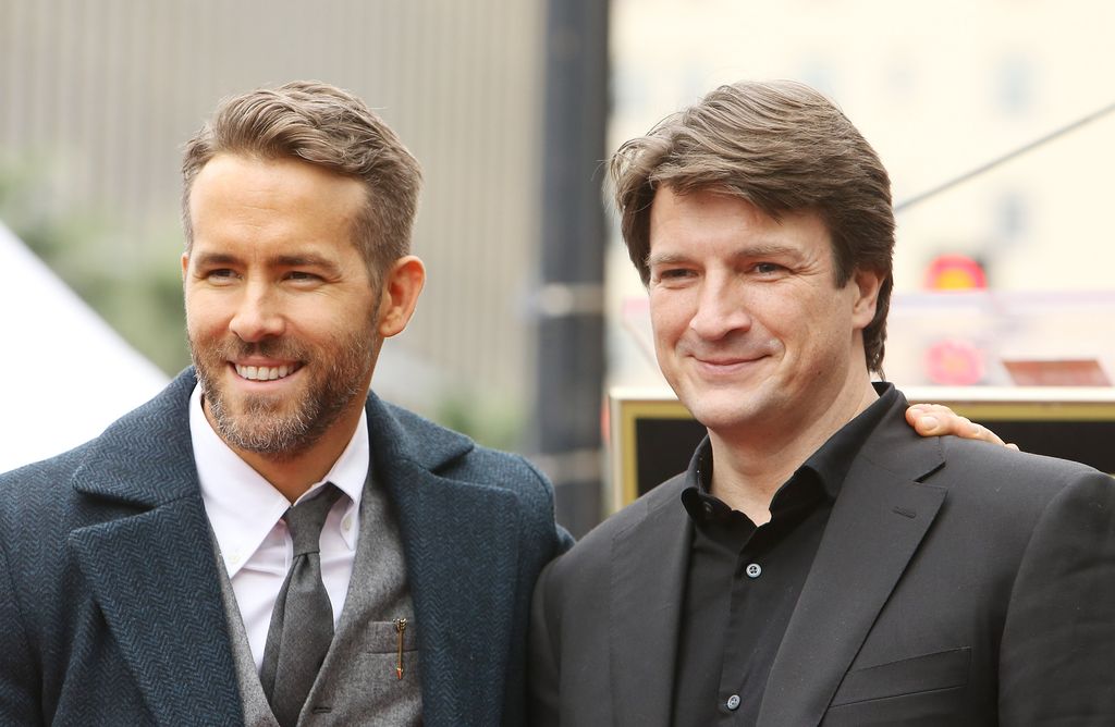 Ryan Reynolds (L) and Nathan Fillion attend the ceremony honoring actor Ryan Reynolds with a Star on The Hollywood Walk of Fame held on December 15, 2016 