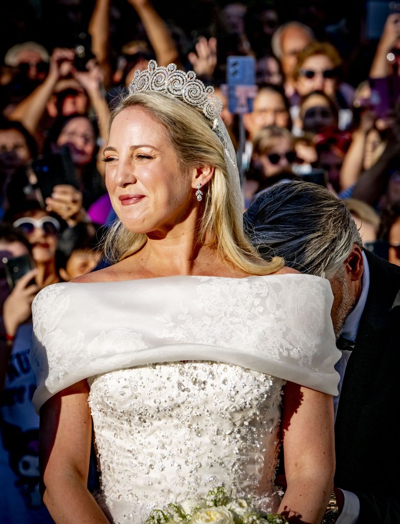 princess theodora smiling waist up in bridal gown