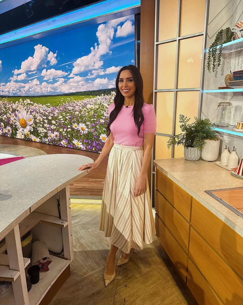 Christine Lampard wearing a midi skirt and pink tshirt on Lorraine