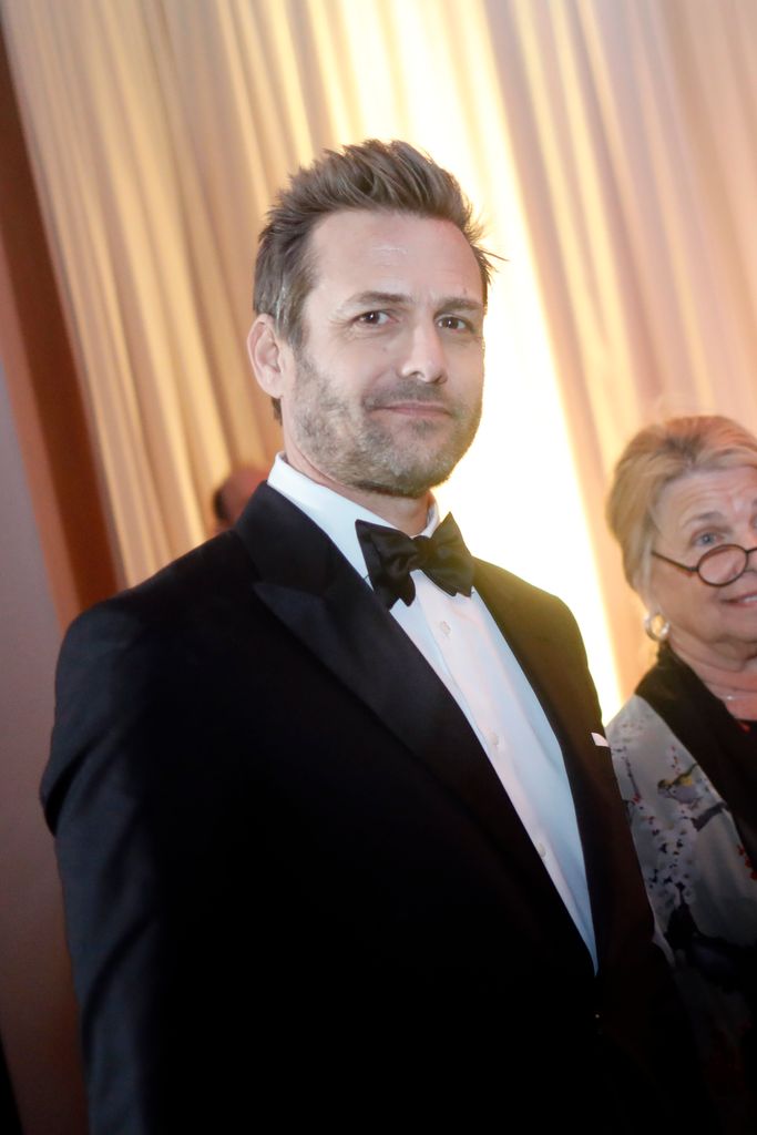Gabriel Macht attends the 81st Annual Golden Globe Awards with his mom