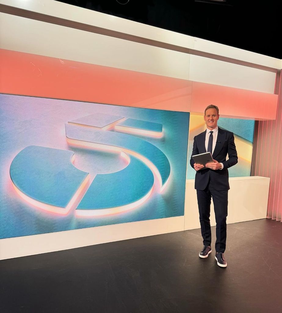 Dan Walker in a blue suit and blue trainers on Channel 5