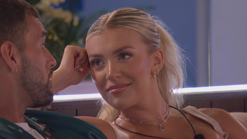 Molly and Zachariah look at each other during conversation on Love Island