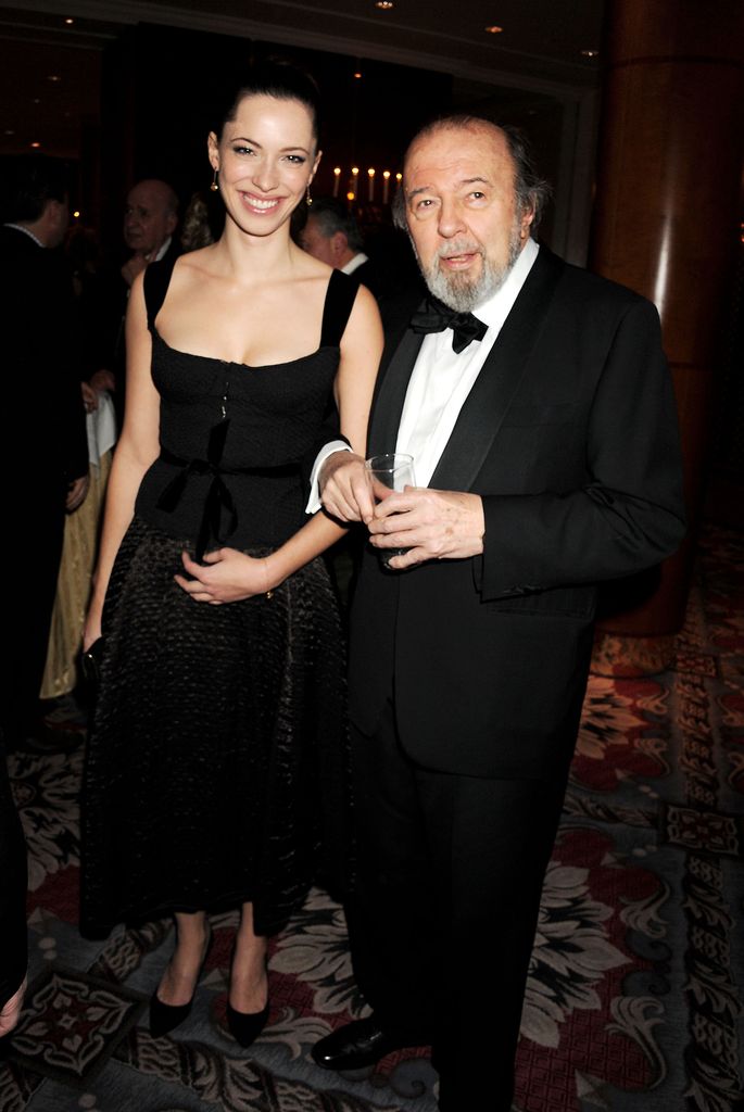 Rebecca Hall in a black dress with father Peter Hall