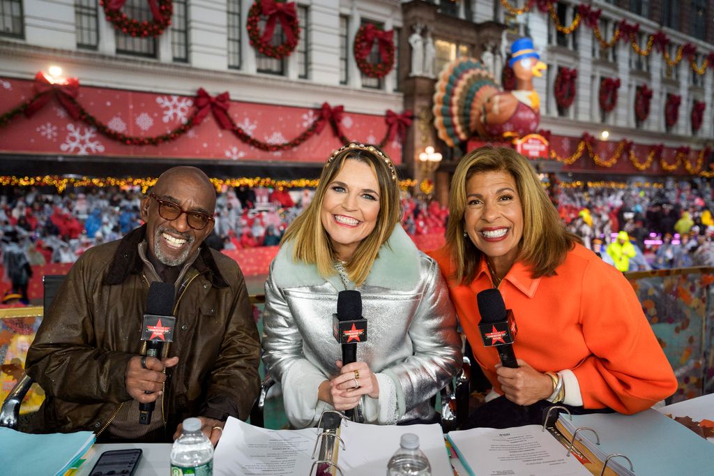 MACY'S THANKSGIVING DAY PARADE -- Downtown -- Pictured: (l-r) Al Roker, Savannah Guthrie, Hoda Kotb