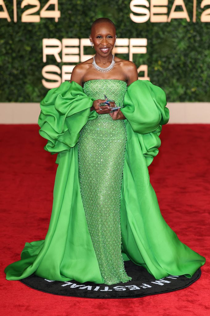 Cynthia Erivo on red carpet in green gown