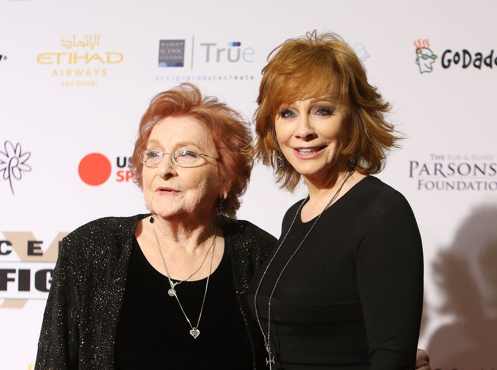 Reba McEntire (R) and Jacqueline Smith arrive at Muhammad Ali's 22nd Celebrity Fight Night held in 2016